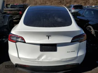 2023 Tesla Model Y Long Range z VIN 7SAYGDEE5PF785124, wystawiony jako Copart lot #56553785 z przebiegiem 31 341 mil mil oraz Szkoda całkowita • Salvage title. Historia ofert i sprzedaży dostępna na DreamBid. Obrazek 6.