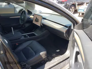 2023 Tesla Model 3 z VIN 5YJ3E1EA2PF569644, wystawiony jako IAAI lot #41831560 z przebiegiem 30 903 mil mil oraz . Historia ofert i sprzedaży dostępna na DreamBid. Obrazek 5.