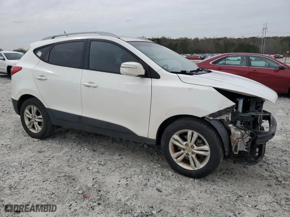 2013 Hyundai Tucson GLS with VIN KM8JU3AC3DU657226, listed as a Copart auction lot 50011135 with 169,644 mi miles and Salvage Title. Bid and sale history available at carsss.com. Image 4.