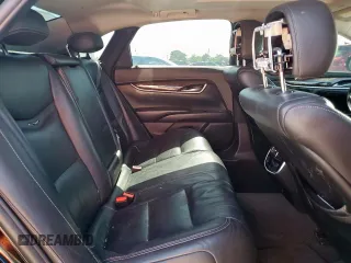 2014 Cadillac XTS Luxury z VIN 2G61M5S39E9302853, wystawiony jako Copart lot #57712215 z przebiegiem 180 886 mil mil oraz Czysty tytuł • Clean title. Historia ofert i sprzedaży dostępna na DreamBid. Obrazek 10.