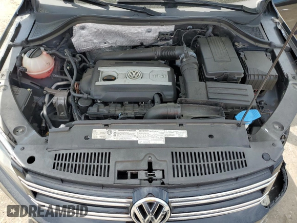 2013 Volkswagen Tiguan SE z VIN WVGAV7AX4DW523112, wystawiony jako Copart lot #53261855 z przebiegiem 86 190 mil mil oraz Szkoda całkowita • Salvage title. Historia ofert i sprzedaży dostępna na DreamBid. Obrazek 12.