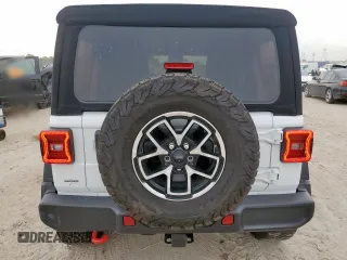 2024 Jeep Wrangler Rubicon with VIN 1C4PJXFG2RW266901, listed as a Copart auction lot 60641445 with 3,908 mi miles and Salvage title. Bid and sale history available at DreamBid. Image 6.