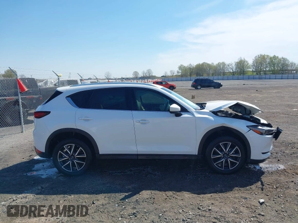 2018 Mazda CX-5 Grand Touring with VIN JM3KFBDM0J0404635, listed as a IAAI auction lot 41883068 with 71,178 mi miles. Bid and sale history available at carsss.com. Image 13.