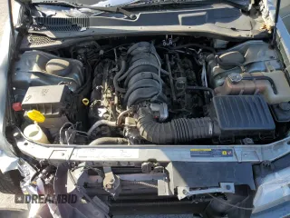 2006 Chrysler 300 C z VIN 2C3LA63H66H408557, wystawiony jako Copart lot #57797005 z przebiegiem 71 932 mil mil oraz Szkoda całkowita • Salvage title. Historia ofert i sprzedaży dostępna na DreamBid. Obrazek 11.