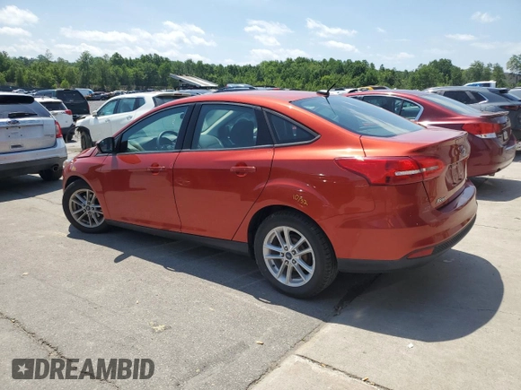 2018 Ford Focus SE z VIN 1FADP3F2XJL254750, wystawiony jako Copart lot #61907545 z przebiegiem 71 328 mil mil oraz Szkoda całkowita • Salvage title. Historia ofert i sprzedaży dostępna na DreamBid. Obrazek 2.