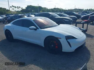 2023 Porsche Taycan with VIN WP0AA2Y19PSA14894, listed as a IAAI auction lot 40910522 with 14,692 mi miles and . Bid and sale history available at DreamBid. Image 1.