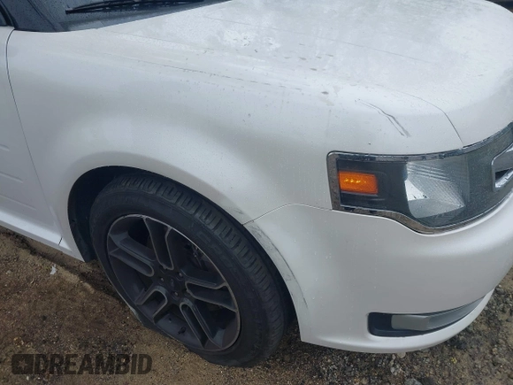 2015 Ford Flex SEL z VIN 2FMGK5C89FBA02548, wystawiony jako IAAI lot #41775436 z przebiegiem 132 856 mil mil oraz . Historia ofert i sprzedaży dostępna na DreamBid. Obrazek 6.