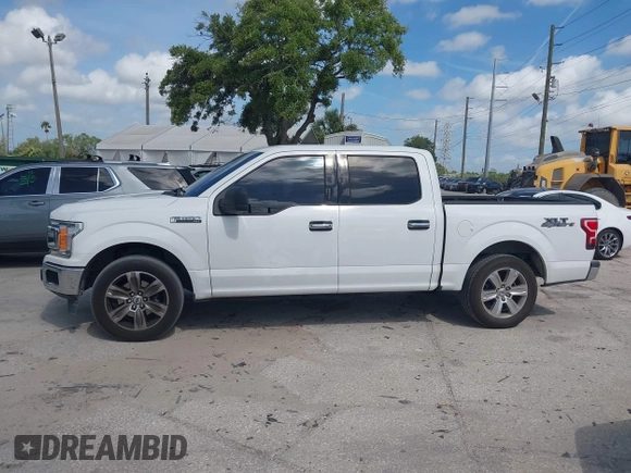 2018 Ford F-150 XL with VIN 1FTEW1CB8JFC47174, listed as a IAAI auction lot 41956391 with 148,337 mi miles. Bid and sale history available at carsss.com. Image 14.
