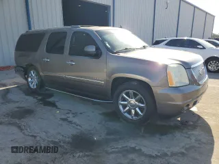 2012 GMC Yukon XL Denali z VIN 1GKS1MEF8CR157189, wystawiony jako Copart lot #55086915 z przebiegiem 172 640 mil mil oraz Szkody całkowita. Historia ofert i sprzedaży dostępna na DreamBid. Obrazek 4.