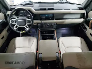 2024 Land Rover Defender S with VIN SALEJ7EX4R2283949, listed as a Copart auction lot 83841744 with 9,824 mi miles and Salvage title. Bid and sale history available at DreamBid. Image 8.