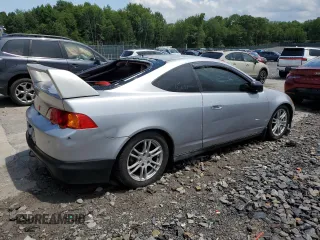 2002 Acura RSX Auto with VIN JH4DC54882C011723, listed as a Copart auction lot 64187865 with 106,692 mi miles and Clean title. Bid and sale history available at DreamBid. Image 3.