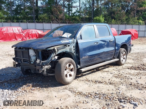 2019 Ram 1500 Big Horn z VIN 1C6RRFFG0KN909003, wystawiony jako IAAI lot #39513660 z przebiegiem 84 291 mil mil oraz . Historia ofert i sprzedaży dostępna na DreamBid. Obrazek 2.