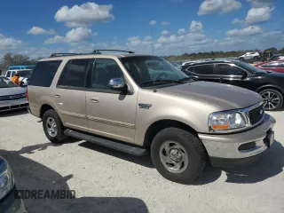 1997 Ford Expedition XLT with VIN 1FMEU17L7VLB84516, listed as a Copart auction lot 76664984 with 269,040 mi miles and Salvage title. Bid and sale history available at DreamBid. Image 4.