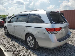 2014 Honda Odyssey EX-L with VIN 5FNRL5H63EB042207, listed as a Copart auction lot 61957605 with 204,563 mi miles and Salvage title. Bid and sale history available at DreamBid. Image 2.