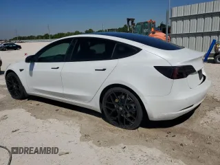 2022 Tesla Model 3 with VIN 5YJ3E1EA0NF108956, listed as a Copart auction lot 50066235 with 35,180 mi miles and Non Repairable. Bid and sale history available at DreamBid. Image 2.