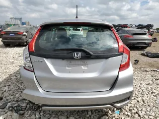 2019 Honda Fit LX z VIN 3HGGK5H47KM722595, wystawiony jako Copart lot #56819975 z przebiegiem 31 371 mil mil oraz Szkoda całkowita • Salvage title. Historia ofert i sprzedaży dostępna na DreamBid. Obrazek 6.