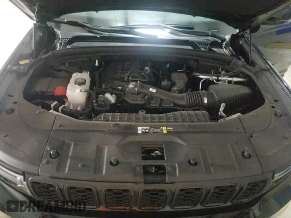 2023 Jeep Grand Cherokee Laredo with VIN 1C4RJJAG6P8867033, listed as a Copart auction lot 77134103 with 7,806 mi miles and Clean title. Bid and sale history available at DreamBid. Image 12.