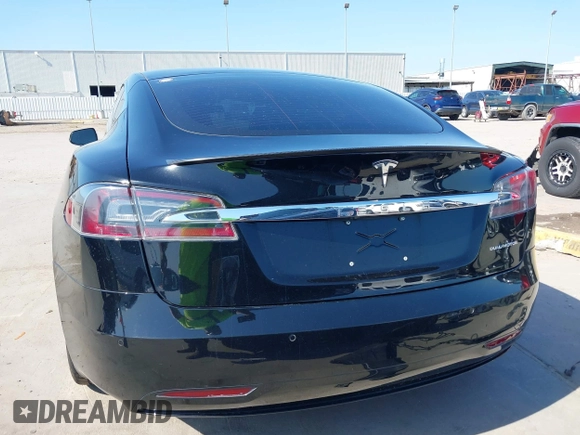 2021 Tesla Model S Long Range Plus with VIN 5YJSA1E28MF426080, listed as a IAAI auction lot 41979326 with 125,328 mi miles and . Bid and sale history available at DreamBid. Image 17.