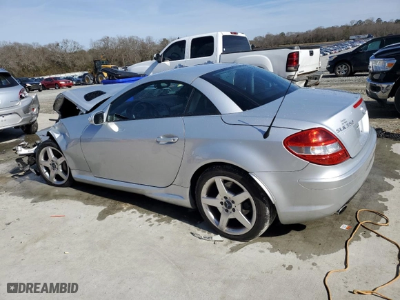 2006 Mercedes-Benz SLK-Class 3.5L with VIN WDBWK56F76F104650, listed as a Copart auction lot 42739245 with 69,612 mi miles and Salvage Title. Bid and sale history available at carsss.com. Image 2.