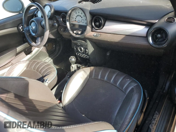 2014 MINI Convertible S with VIN WMWZP3C55ET298172, listed as a Copart auction lot 76977114 with 119,138 mi miles and Salvage title. Bid and sale history available at DreamBid. Image 8.