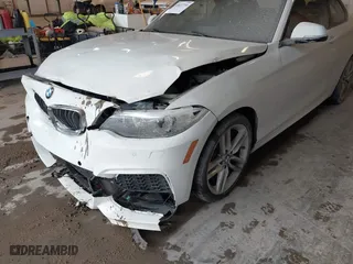 2016 BMW 2 Series 228i xDrive with VIN WBA1G9C53GVX97088, listed as a IAAI auction lot 41617710 with 72,978 mi miles. Bid and sale history available at carsss.com. Image 12.