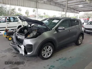 2019 Kia Sportage LX with VIN KNDPM3AC0K7561130, listed as a IAAI auction lot 41391657 with 152,728 mi miles and . Bid and sale history available at carsss.com. Image 2.