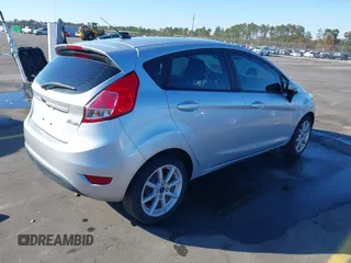 2019 Ford Fiesta SE with VIN 3FADP4EJ0KM107058, listed as a IAAI auction lot 40979683 with 116,854 mi miles. Bid and sale history available at carsss.com. Image 4.