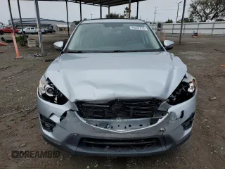 2016 Mazda CX-5 Grand Touring with VIN JM3KE2DY2G0894056, listed as a Copart auction lot 49247815 with 56,039 mi miles and Salvage Title. Bid and sale history available at carsss.com. Image 5.