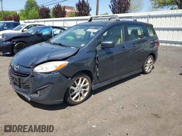 2012 Mazda 5 Grand Touring with VIN JM1CW2DLXC0121134, listed as a Copart auction lot 56539825 with 130,962 mi miles and Salvage title. Bid and sale history available at DreamBid. Image 1.