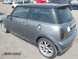 2006 MINI Hardtop S with VIN WMWRE33576TL20826, listed as a IAAI auction lot 42130614 with 160,938 mi miles and . Bid and sale history available at DreamBid. Image 3.