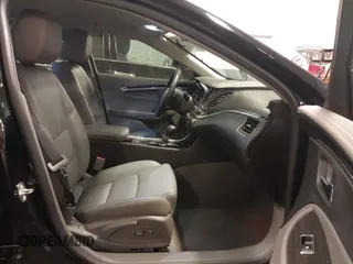 2018 Chevrolet Impala LT with VIN 1G1105S32JU122113, listed as a IAAI auction lot 42042957 with 152,895 mi miles and . Bid and sale history available at DreamBid. Image 5.