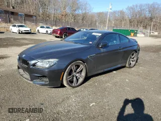 2015 BMW M6 with VIN WBSLX9C58FD160643, listed as a Copart auction lot 49293955 with 87,568 mi miles and Salvage Title. Bid and sale history available at carsss.com. Image 1.