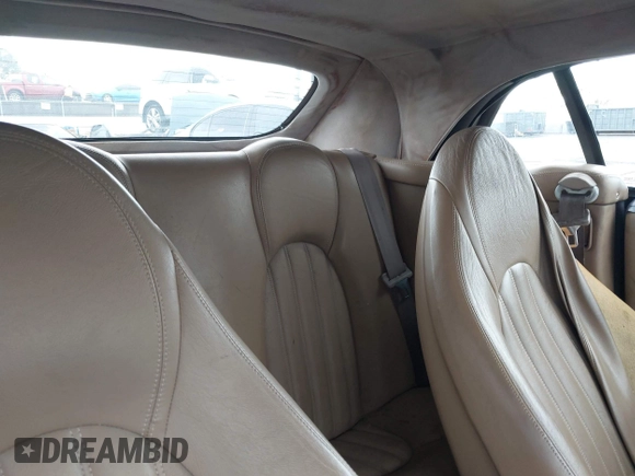 1997 Jaguar XK with VIN SAJGX2745VC017589, listed as a IAAI auction lot 42208129 with Not Provided miles and . Bid and sale history available at DreamBid. Image 8.
