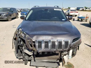 2019 Jeep Cherokee Altitude with VIN 1C4PJLLB3KD184565, listed as a Copart auction lot 58046345 with 91,618 mi miles and Salvage title. Bid and sale history available at DreamBid. Image 5.