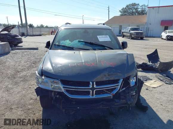 2019 Dodge Journey SE Value with VIN 3C4PDCAB8KT873487, listed as a IAAI auction lot 41499688 with 257,391 mi miles and . Bid and sale history available at DreamBid. Image 13.