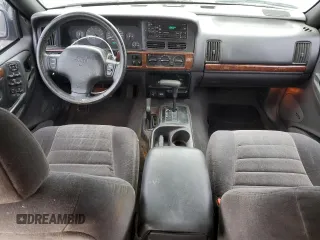 1997 Jeep Grand Cherokee Laredo with VIN 1J4GZ58Y5VC637350, listed as a Copart auction lot 77405444 with 182,482 mi miles and Clean Title. Bid and sale history available at carsss.com. Image 8.