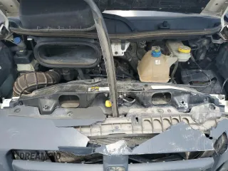 2014 Ram ProMaster Cargo z VIN 3C6TRVDG5EE104271, wystawiony jako Copart lot #57152155 z przebiegiem 145 129 mil mil oraz Szkoda całkowita • Salvage title. Historia ofert i sprzedaży dostępna na DreamBid. Obrazek 11.