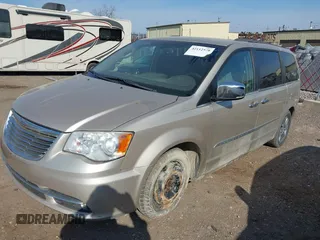 2012 Chrysler Town & Country Touring-L with VIN 2C4RC1CG0CR340692, listed as a IAAI auction lot 42112578 with 200,681 mi miles. Bid and sale history available at carsss.com. Image 2.