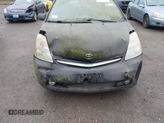2008 Toyota Prius z VIN JTDKB20U187780823, wystawiony jako IAAI lot #42288104 z przebiegiem Nie podano mil oraz . Historia ofert i sprzedaży dostępna na DreamBid. Obrazek 6.