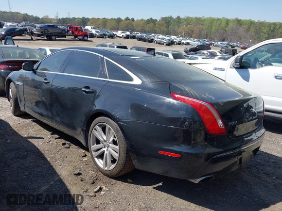 2013 Jaguar XJ Portfolio z VIN SAJWJ2GD0D8V49329, wystawiony jako IAAI lot #41829426 z przebiegiem 125 584 mil mil oraz . Historia ofert i sprzedaży dostępna na DreamBid. Obrazek 3.