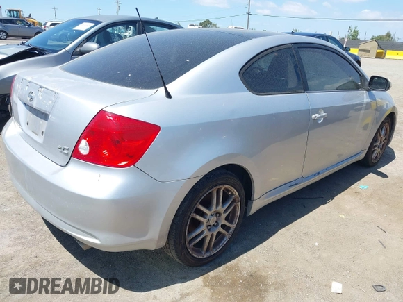 2006 Scion tC with VIN JTKDE177660068512, listed as a IAAI auction lot 42142732 with 304,731 mi miles. Bid and sale history available at carsss.com. Image 4.