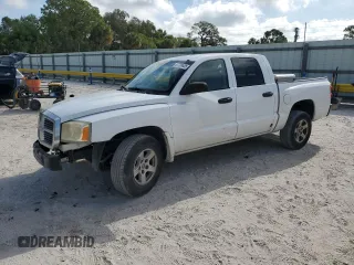 2006 Dodge Dakota SLT with VIN 1D7HE48KX6S576070, listed as a Copart auction lot 57799605 with 236,035 mi miles and Salvage title. Bid and sale history available at DreamBid. Image 1.
