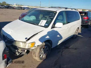 2002 Honda Odyssey EX z VIN 2HKRL18602H522128, wystawiony jako IAAI lot #40879648 z przebiegiem Nie podano mil oraz . Historia ofert i sprzedaży dostępna na DreamBid. Obrazek 2.
