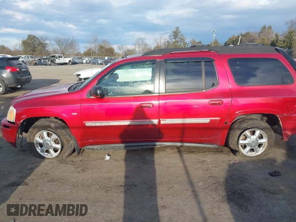 2005 GMC Envoy SLT z VIN 1GKET16M956158147, wystawiony jako IAAI lot #41683236 z przebiegiem Nie podano mil oraz . Historia ofert i sprzedaży dostępna na DreamBid. Obrazek 14.