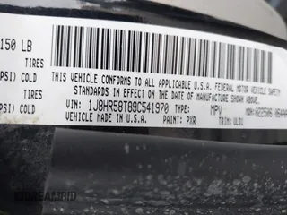 2009 Jeep Grand Cherokee Limited with VIN 1J8HR58T89C541970, listed as a IAAI auction lot 41189623 with 74,161 mi miles. Bid and sale history available at carsss.com. Image 9.
