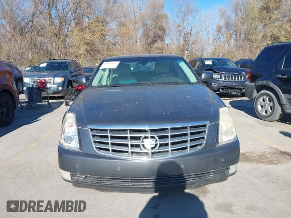 2009 Cadillac DTS 1SA z VIN 1G6KD57Y89U128646, wystawiony jako IAAI lot #40976417 z przebiegiem 167 346 mil mil oraz . Historia ofert i sprzedaży dostępna na DreamBid. Obrazek 6.