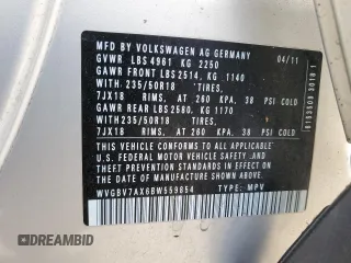 2011 Volkswagen Tiguan SEL z VIN WVGBV7AX6BW559854, wystawiony jako Copart lot #56268195 z przebiegiem 107 428 mil mil oraz Czysty tytuł • Clean title. Historia ofert i sprzedaży dostępna na DreamBid. Obrazek 13.