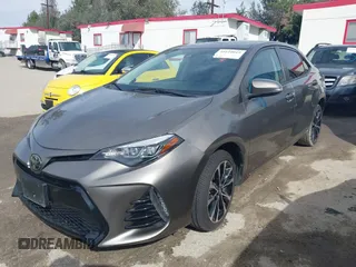 2017 Toyota Corolla L z VIN 5YFBURHE5HP730912, wystawiony jako IAAI lot #41610019 z przebiegiem 61 440 mil mil oraz . Historia ofert i sprzedaży dostępna na DreamBid. Obrazek 2.
