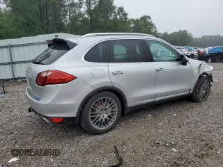 2014 Porsche Cayenne S with VIN WP1AB2A25ELA57213, listed as a Copart auction lot 57843255 with 165,501 mi miles and Salvage title. Bid and sale history available at DreamBid. Image 3.