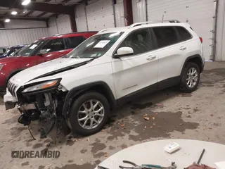2016 Jeep Cherokee Latitude with VIN 1C4PJMCB1GW119621, listed as a IAAI auction lot 41310872 with 123,841 mi miles. Bid and sale history available at carsss.com. Image 17.